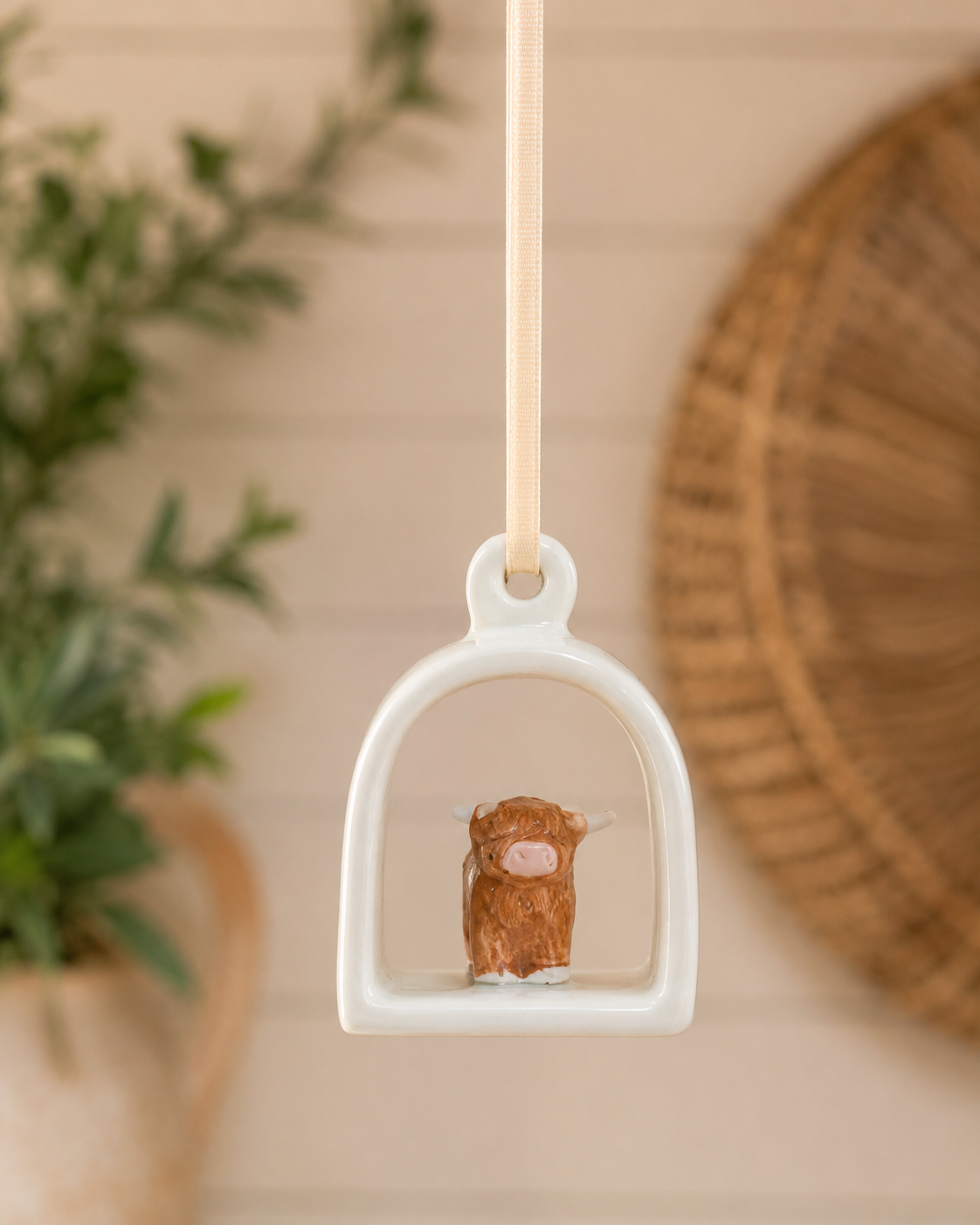 Tiny world ceramic highland cow